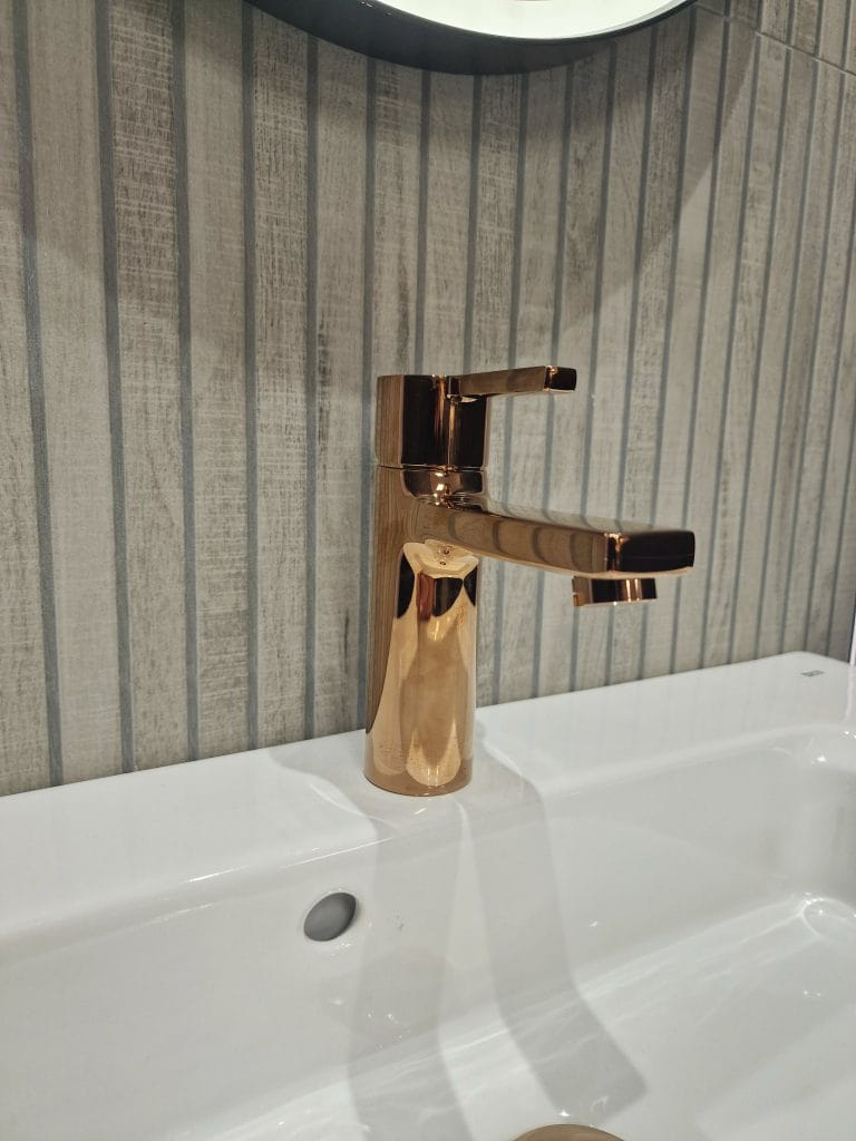 bronze abacus tap fixture hillington showroom