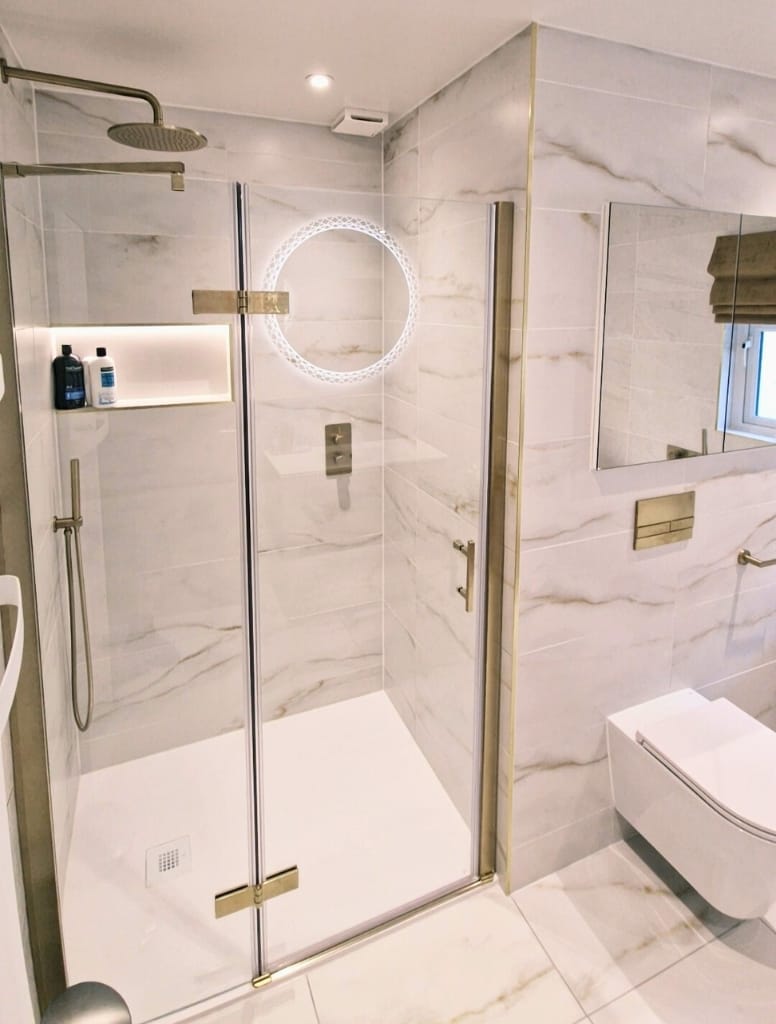 Brush brass shower enclosure with white slate shower tray in Giffnock