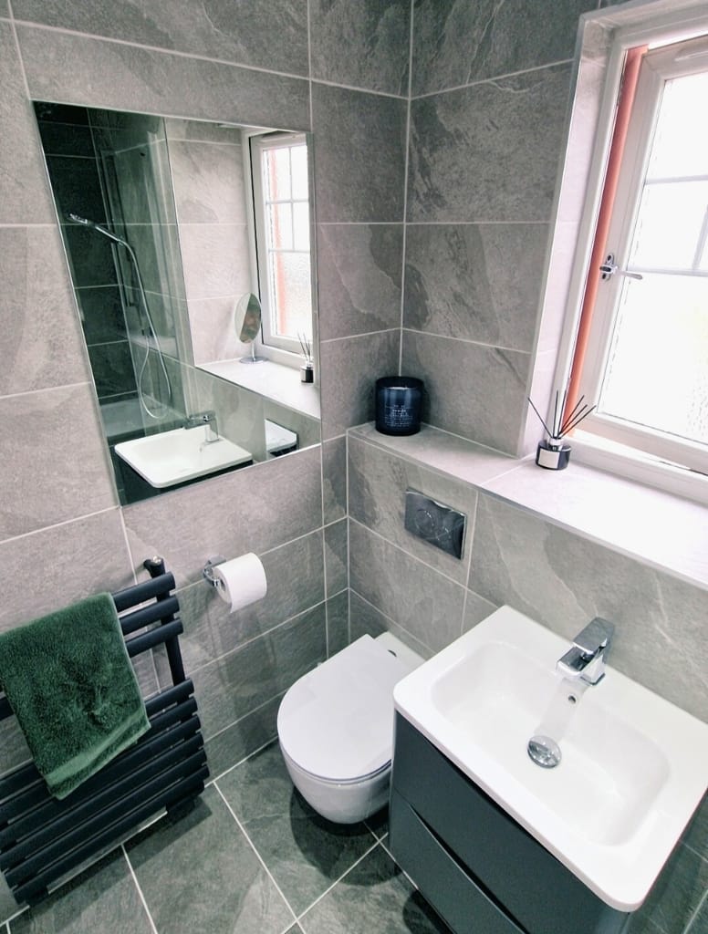 Small bathroom with grey tiles in Largs